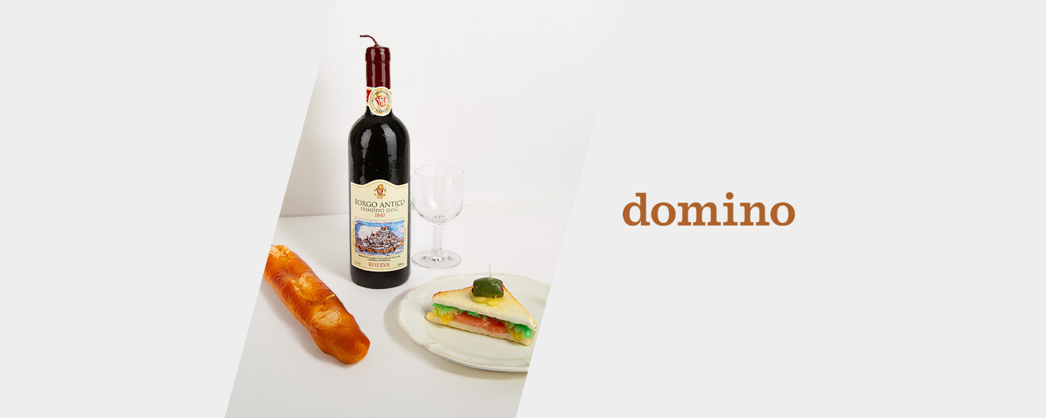 Domino's Features 54Celsius' Baguette and Wine Bottle Candles
